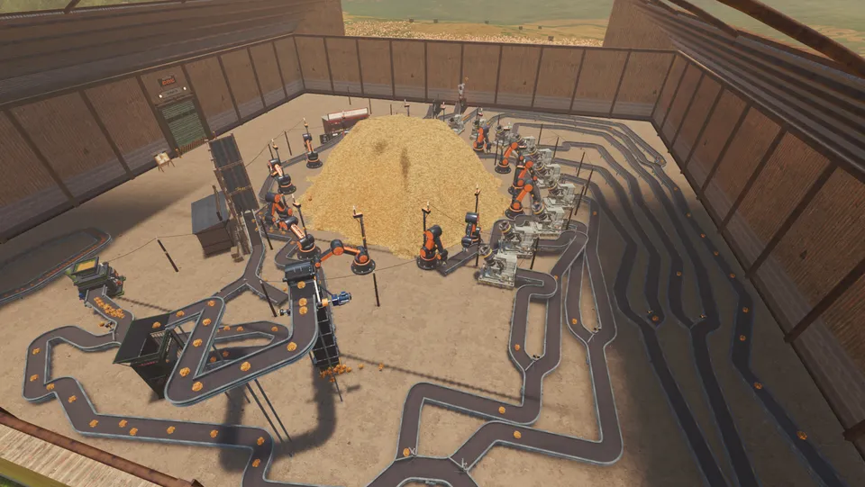 Orange machines and belts around a central hay pile